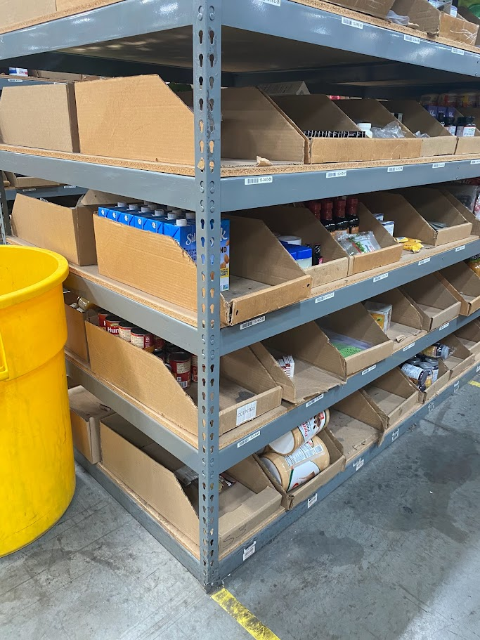 Industrial shelving supply in the Bay Area - shelves filled with food and other items in a warehouse
